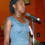 DPS student Kelly Lewis testifies 4 30 10 wearing Bobb on trial slip